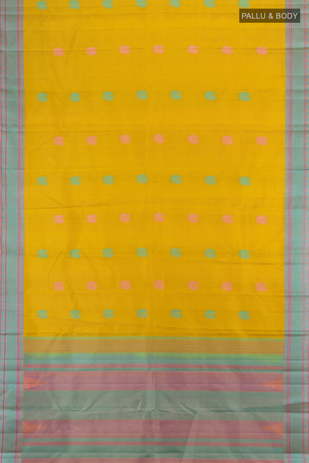 Flat view of Mustard Kanchipuram Silk Saree with Zari Butta on the body and Silk Border. 