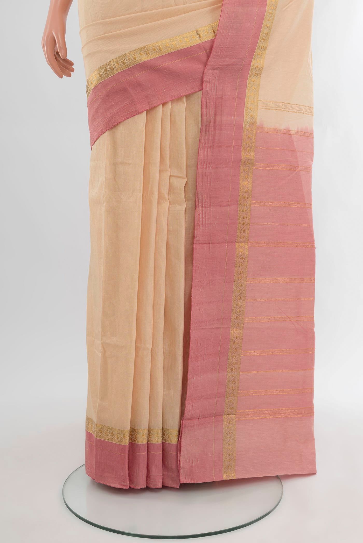 Pleats and pallu of Cream Bangalore Silk Saree with Plain Body and Zari Border. 