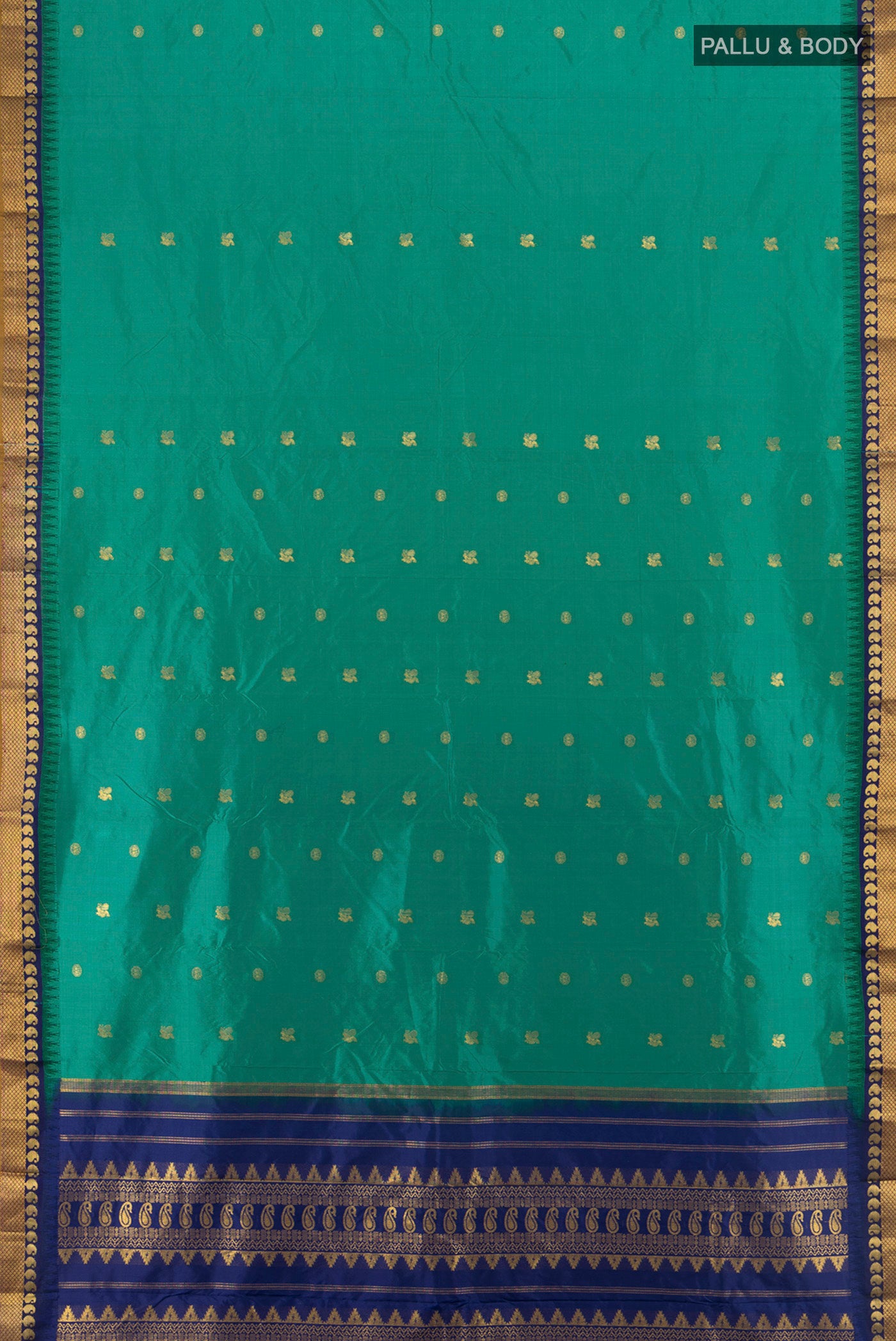 Flat view of Teal Bangalore Silk - kadyal Saree with Zari Butta on the body and Zari Border. 