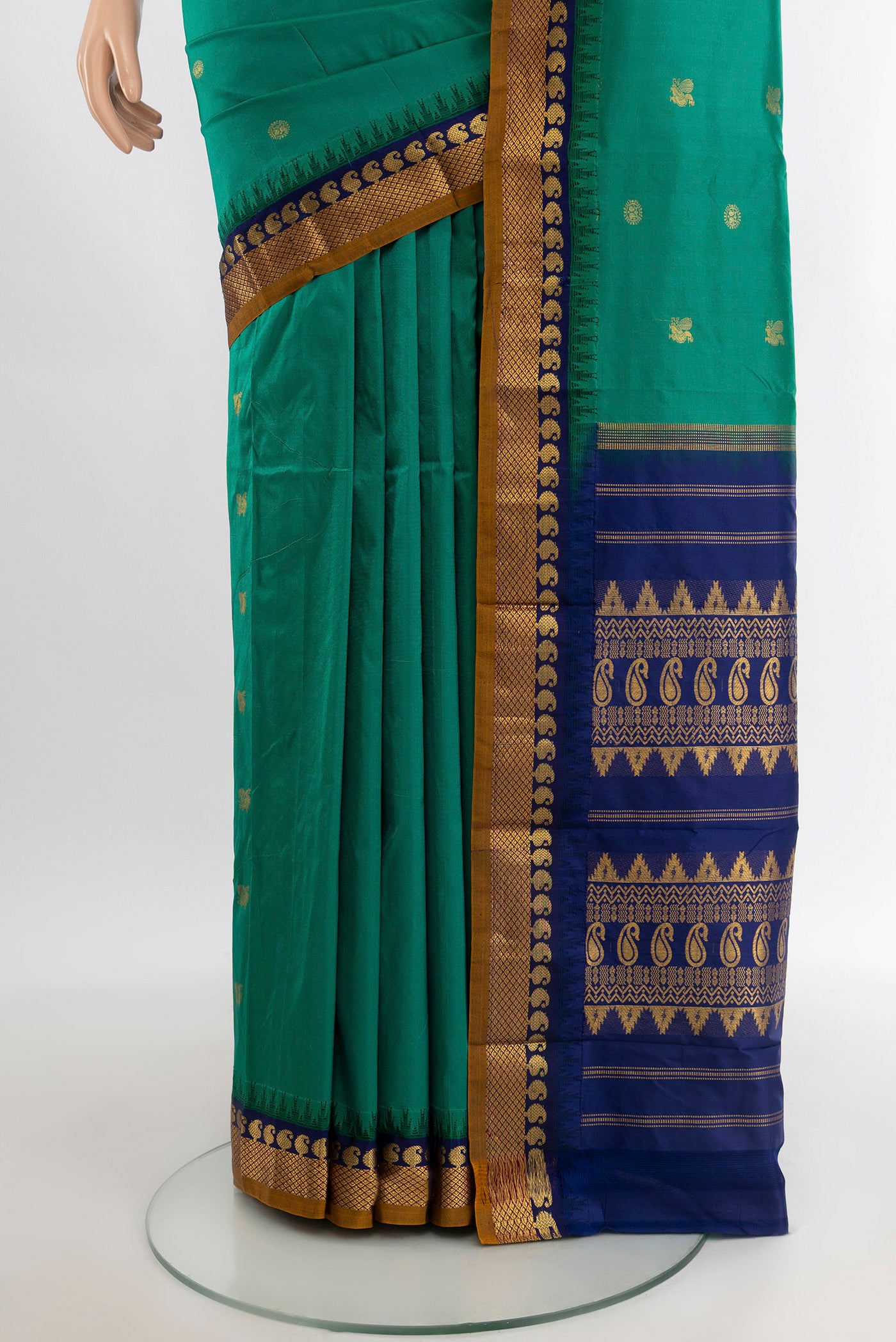 Pleats and pallu of Teal Bangalore Silk - kadyal Saree with Zari Butta on the body and Zari Border. 