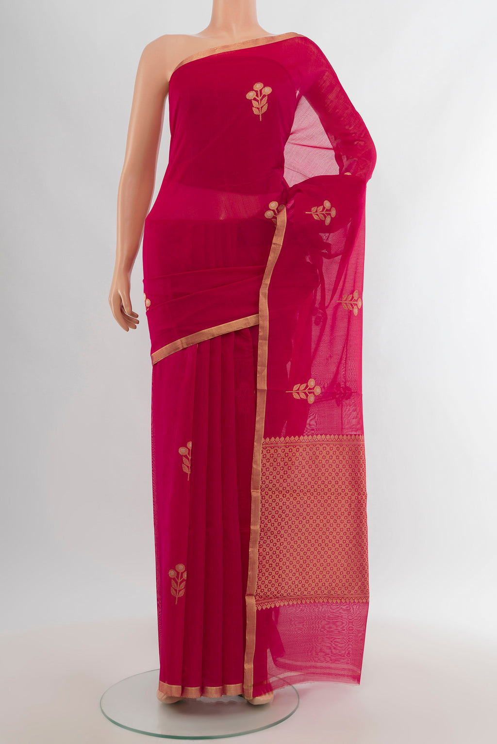 Dark Pink Banarasi Kora Cotton Saree with Zari Butta on the body and Zari Border.  displayed on a mannequin