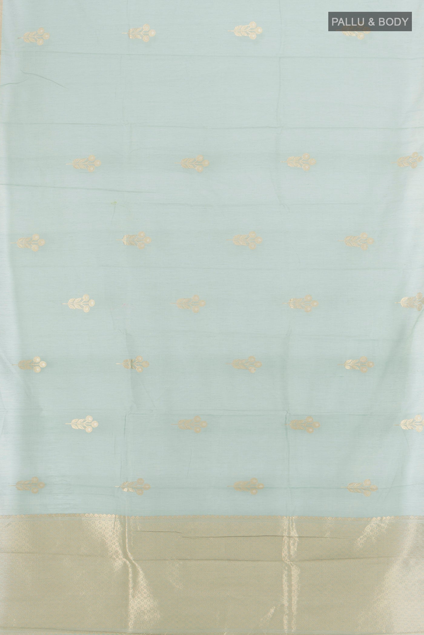 Flat view of Grey Banarasi Kora Cotton Saree with Zari Butta on the body and Zari Border. 