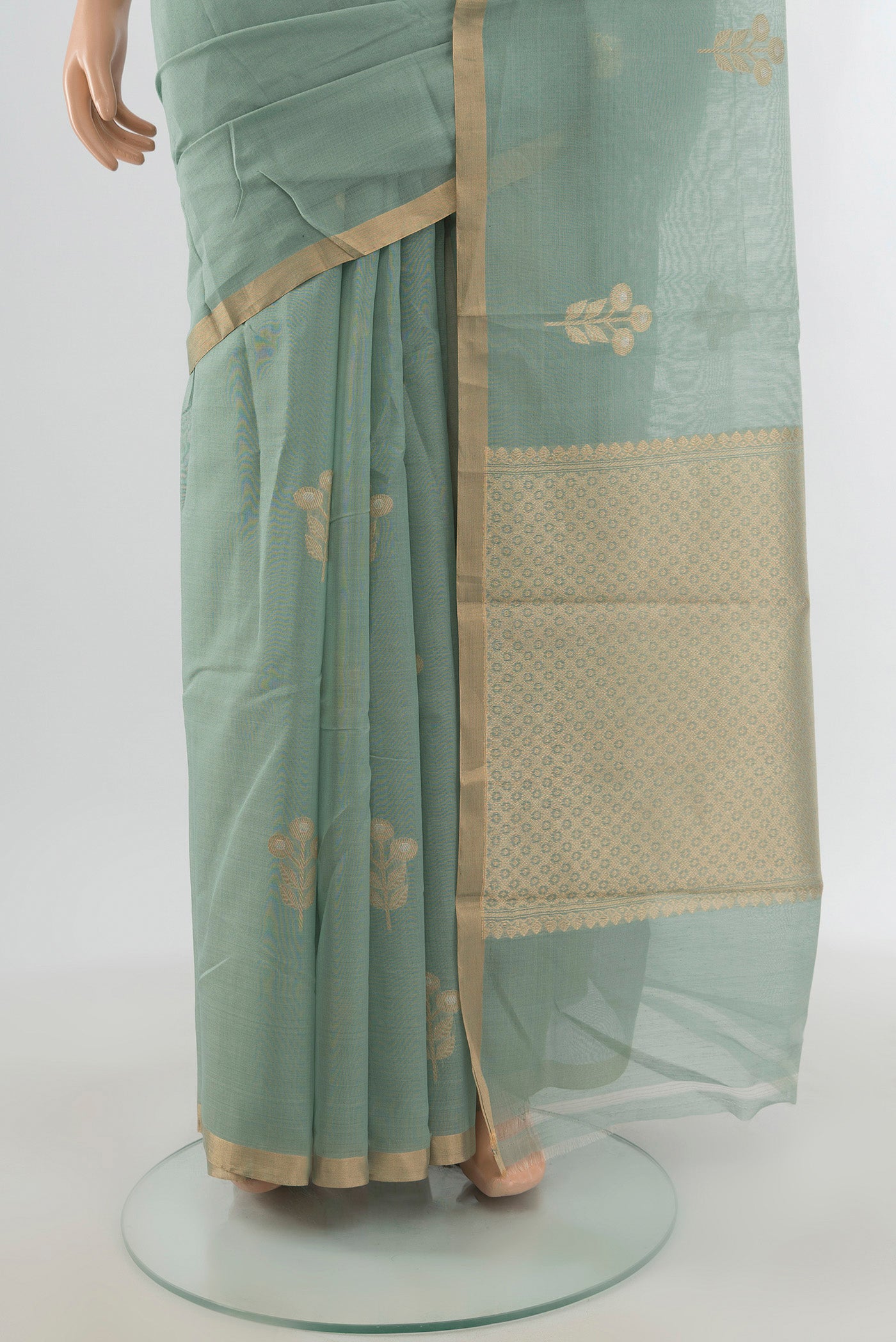 Pleats and pallu of Grey Banarasi Kora Cotton Saree with Zari Butta on the body and Zari Border. 