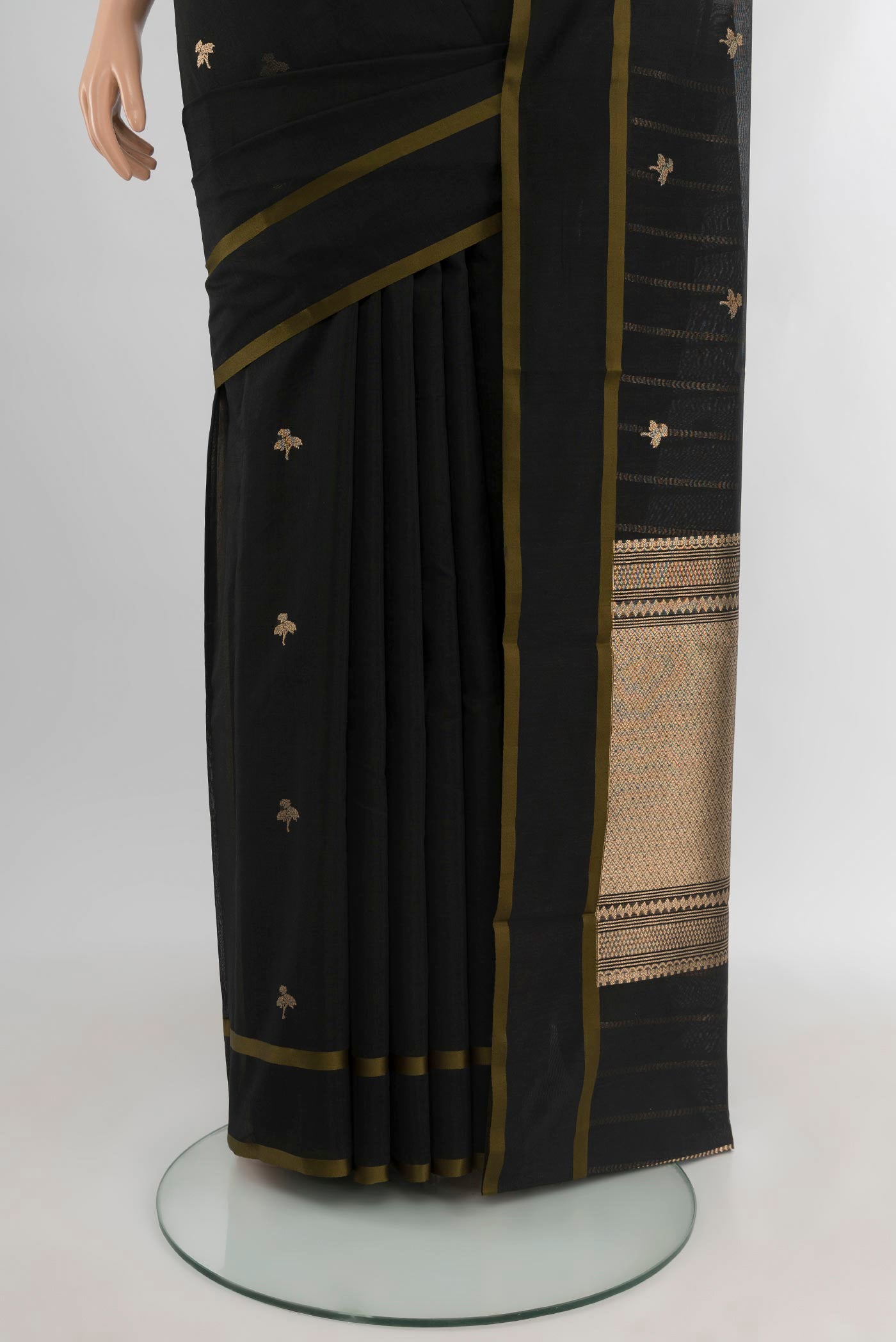 Pleats and pallu of Black Banarasi Kora Cotton Saree with Zari Butta on the body and Zari Border. 