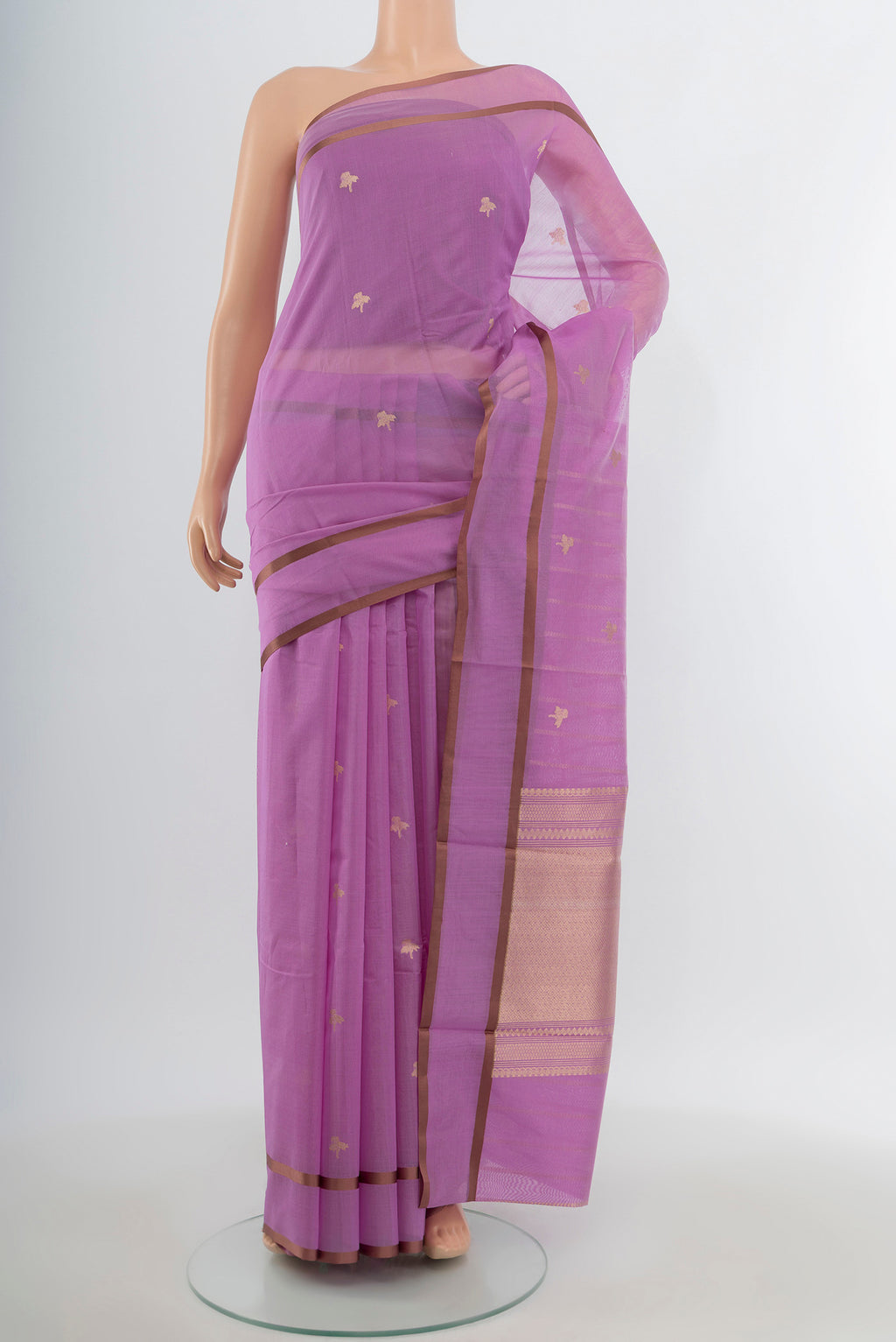 Lavender Banarasi Kora Cotton Saree with Zari Butta on the body and Plain Border.  displayed on a mannequin