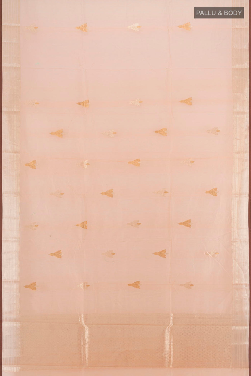 Flat view of Peach Banarasi Kora Cotton Saree with Zari Butta on the body and Zari Border. 