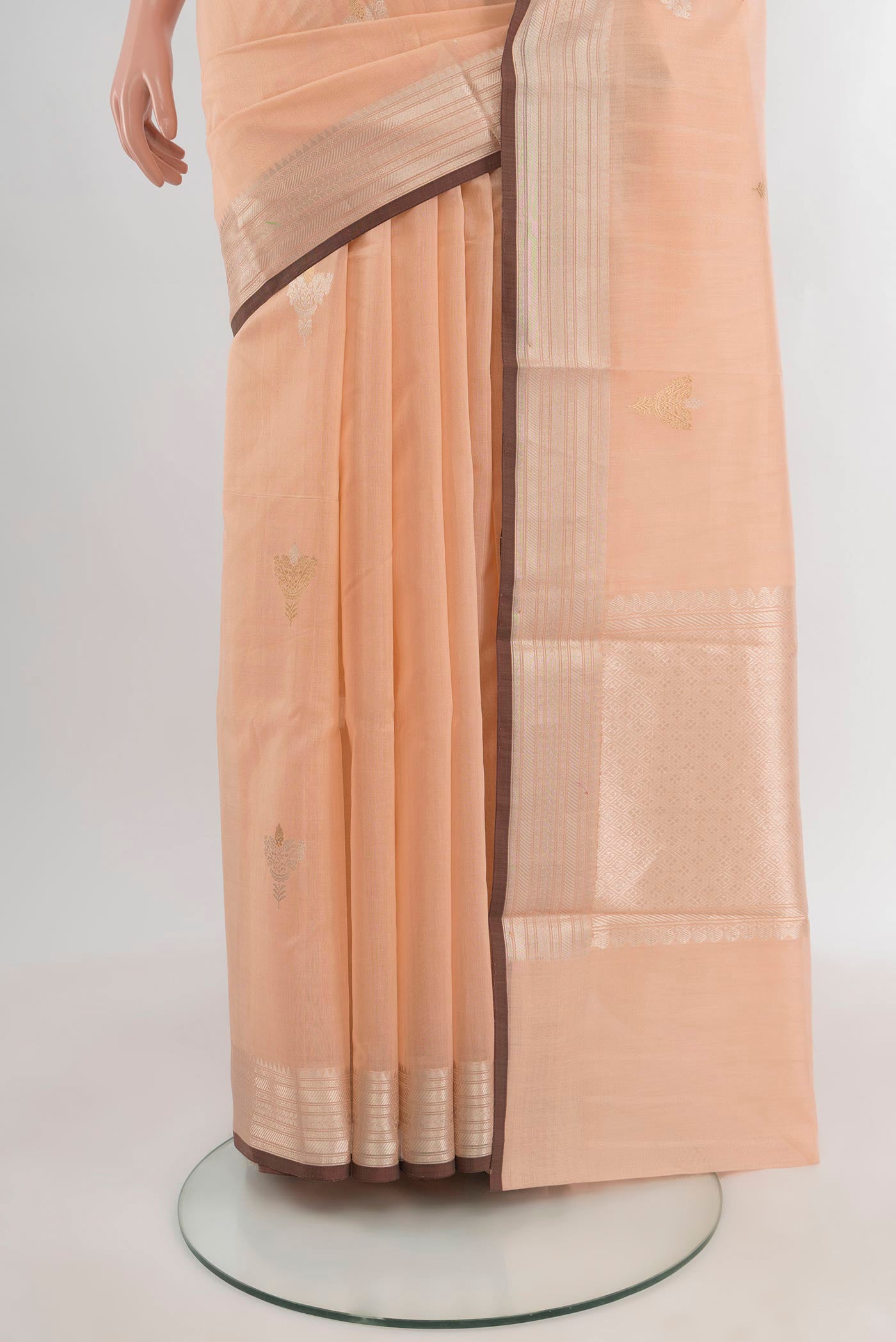 Pleats and pallu of Peach Banarasi Kora Cotton Saree with Zari Butta on the body and Zari Border. 
