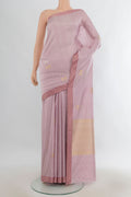 Pure Silk Rose Gold Banarasi Katan Saree with Zari Butta on the body and Plain Border.  displayed on a mannequin