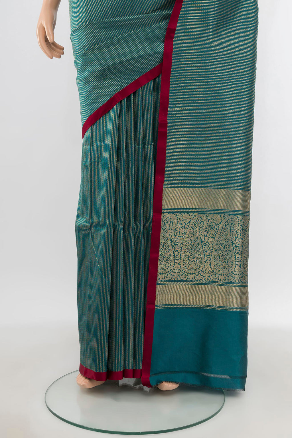 Pleats and pallu of Peacock Blue Banarasi Katan Silk Saree with Stripes on the body and Plain Border. 