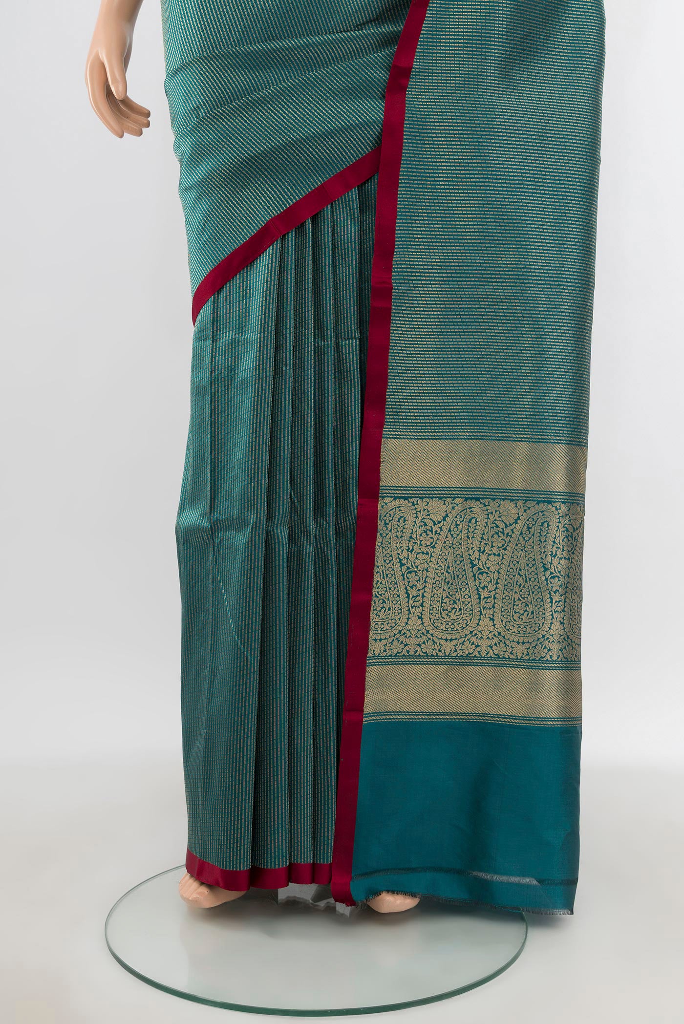 Pleats and pallu of Peacock Blue Banarasi Katan Silk Saree with Stripes on the body and Plain Border. 
