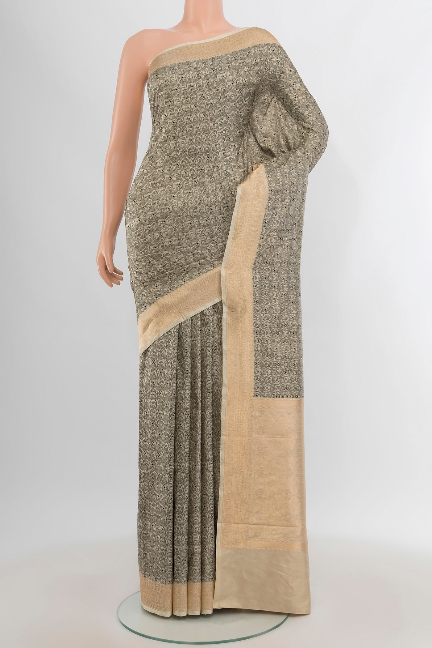 Grey Banarasi Katan Silk Saree with Jacquard design on the body and Zari Border.  displayed on a mannequin