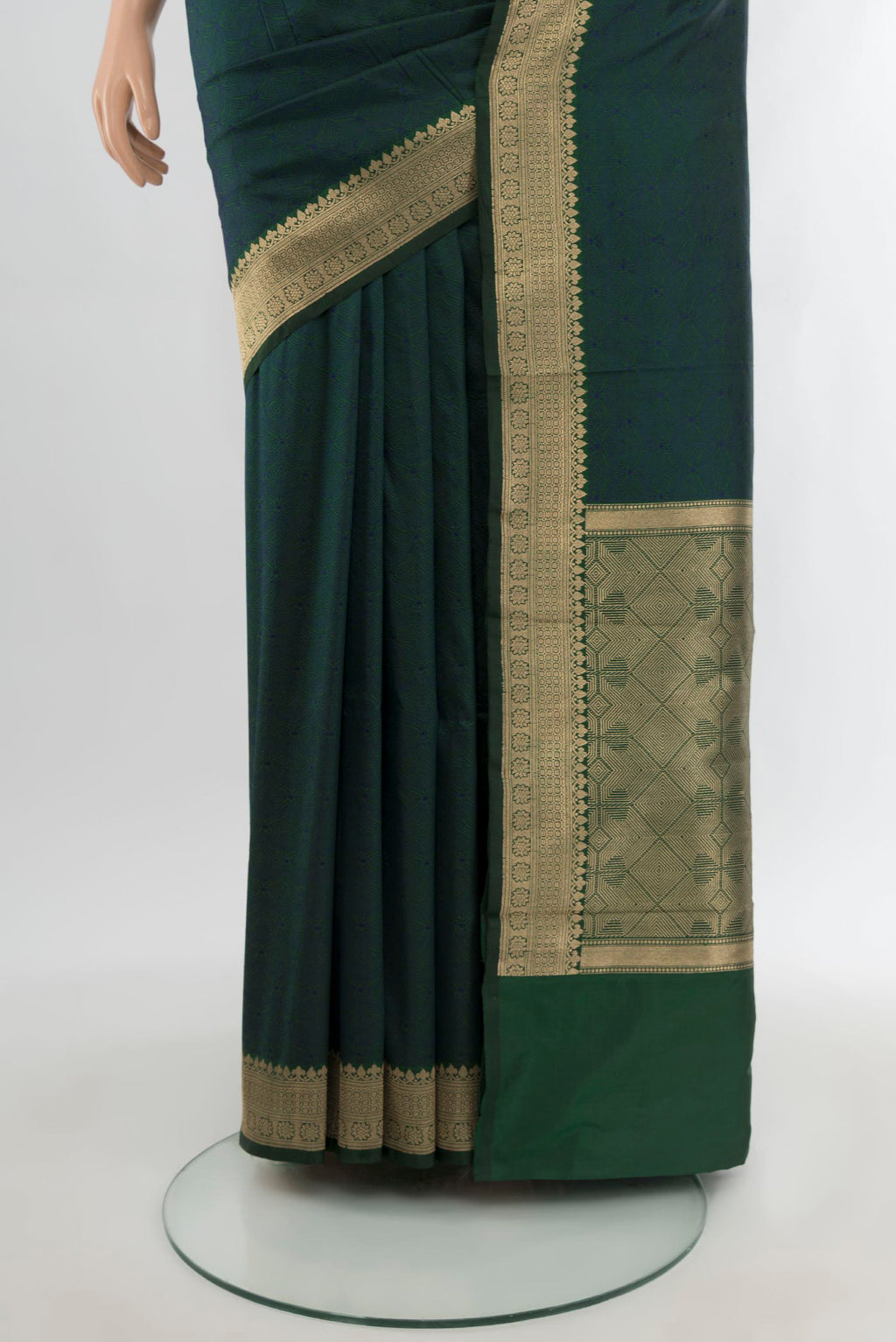 Pleats and pallu of Peacock Blue Dual Tone Banarasi Katan Silk Saree with Plain Body and Zari Border. 