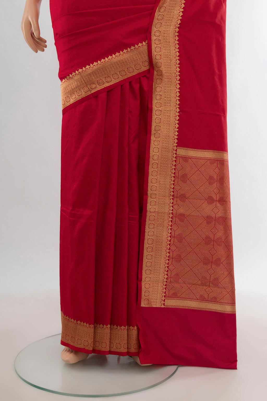 Pleats and pallu of Red Banarasi Katan Silk Saree with Plain Body and Zari Border. 