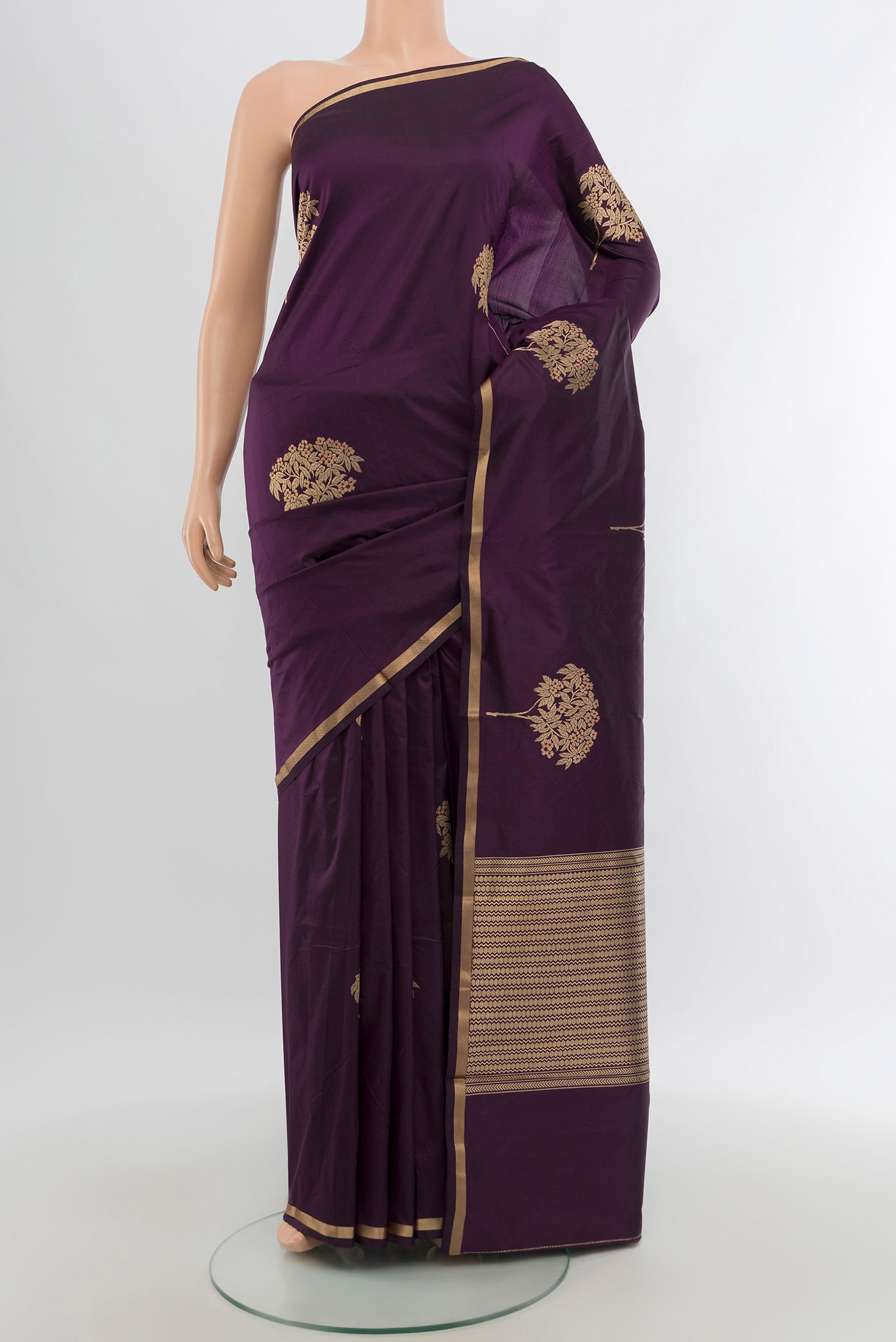 Purple Banarasi Katan Silk Saree with Zari Butta on the body and Zari Border.  displayed on a mannequin