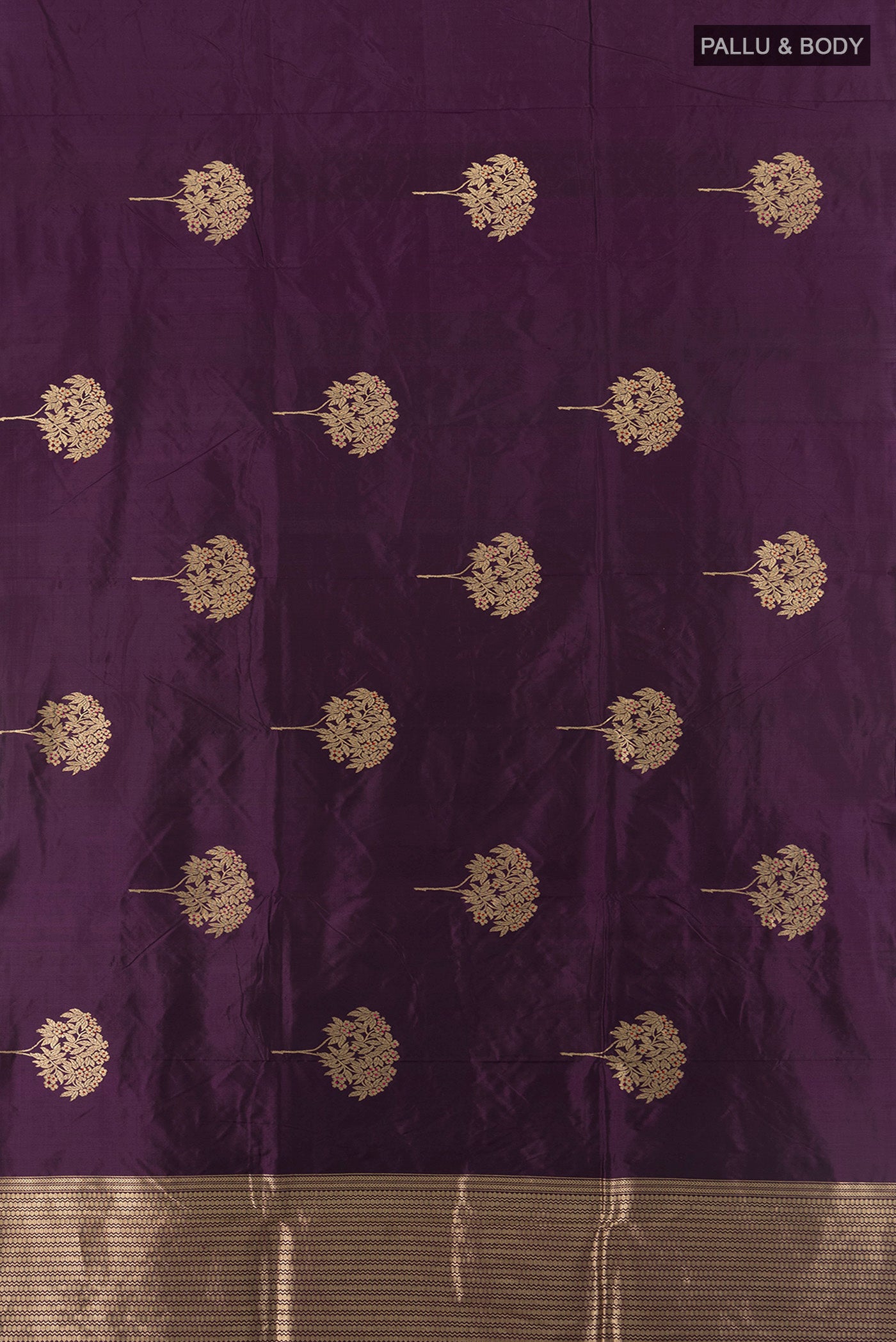 Flat view of Purple Banarasi Katan Silk Saree with Zari Butta on the body and Zari Border. 