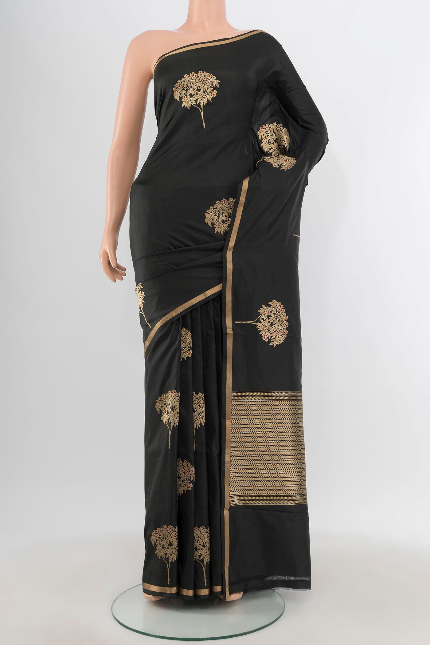 Black Banarasi Katan Silk Saree with Zari Butta on the body and Zari Border.  displayed on a mannequin