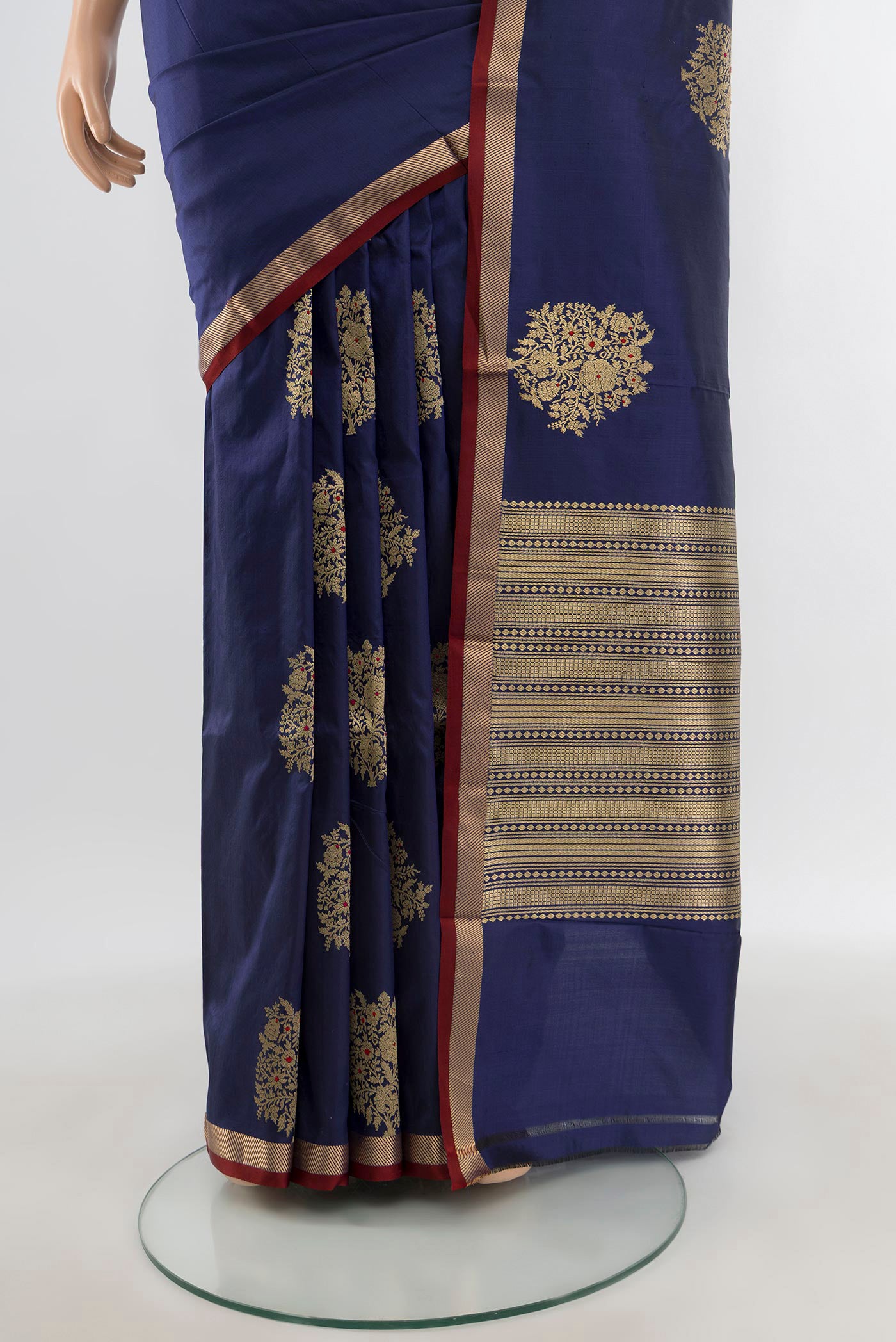 Pleats and pallu of Navy Blue Banarasi Katan Silk Saree with Zari Butta on the body and Zari Border. 