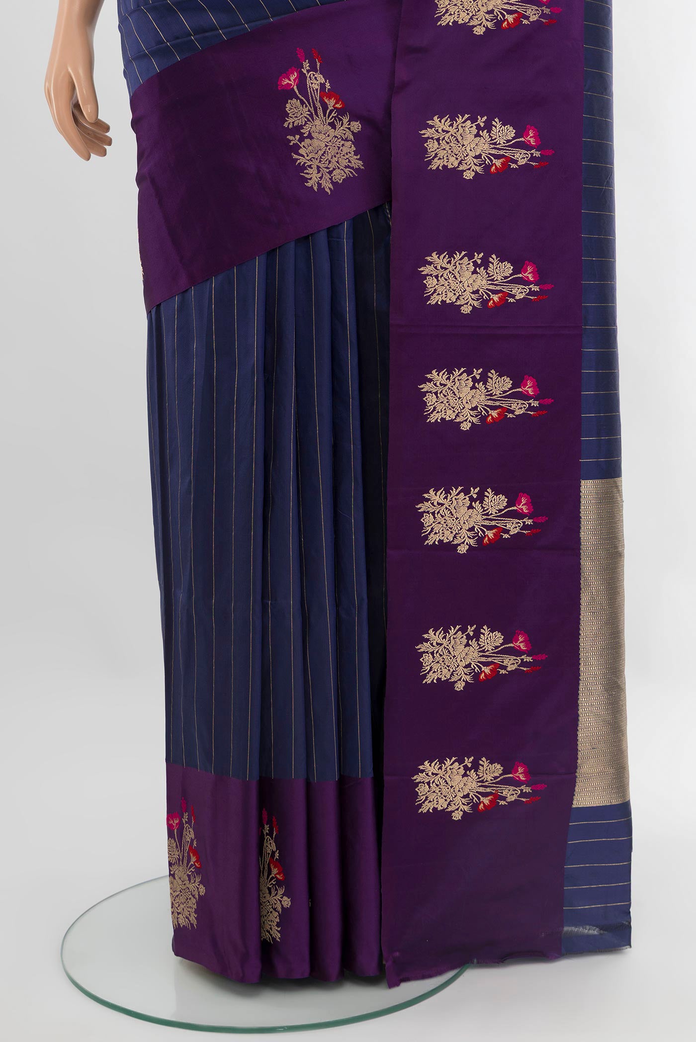Pleats and pallu of Navy Blue Banarasi Katan Silk Saree with Stripes on the body and Zari Border. 
