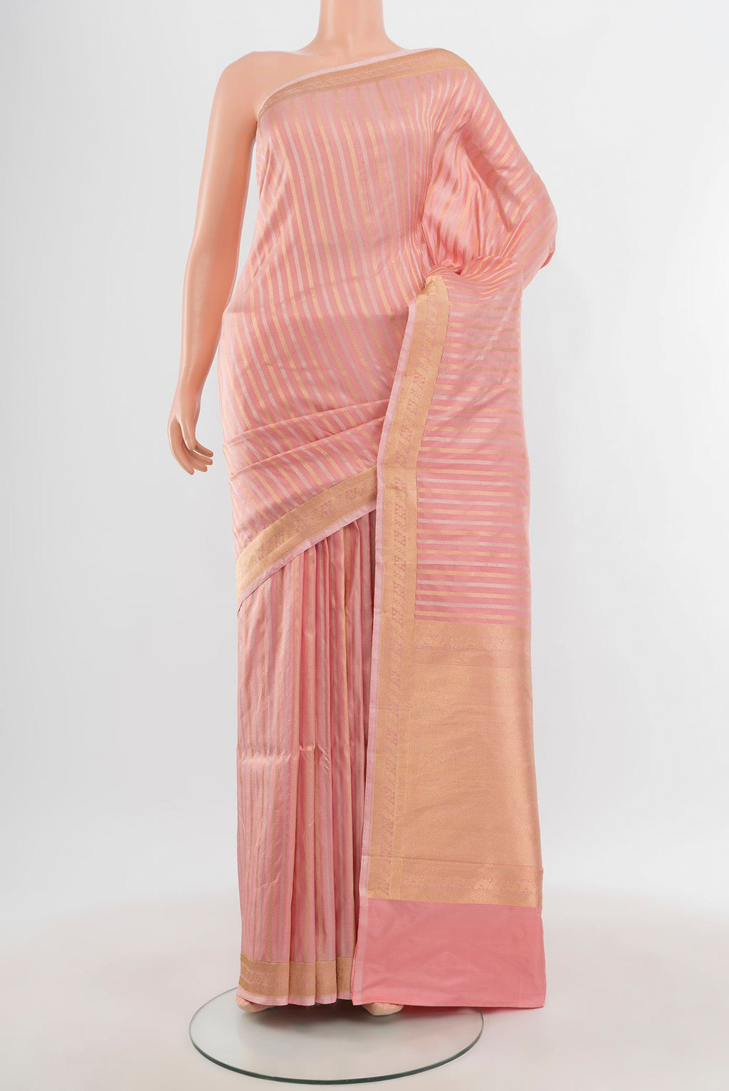 Peach Banarasi Katan Silk Saree with Stripes on the body and Zari Border.  displayed on a mannequin