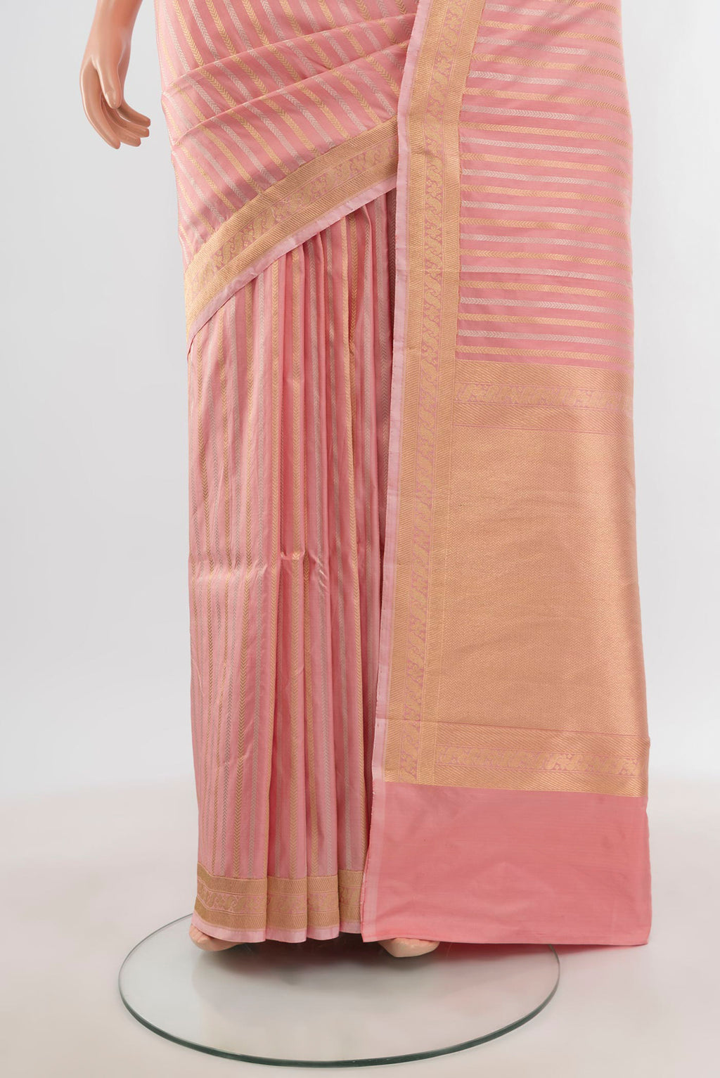 Pleats and pallu of Peach Banarasi Katan Silk Saree with Stripes on the body and Zari Border. 