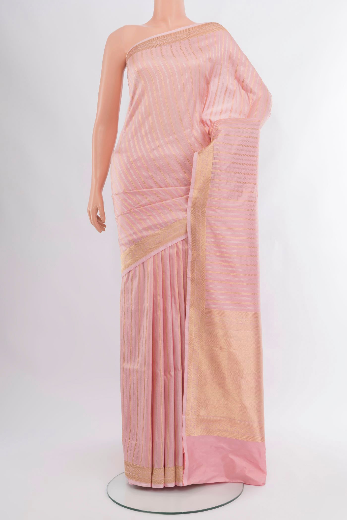 Rose pink Banarasi Katan Silk Saree with Stripes on the body and Zari Border.  displayed on a mannequin