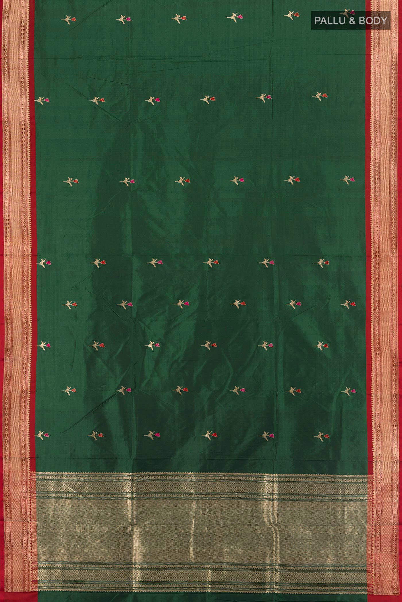 Flat view of Bottle Green Banarasi Katan Silk Saree with Zari Butta on the body and Zari Border. 