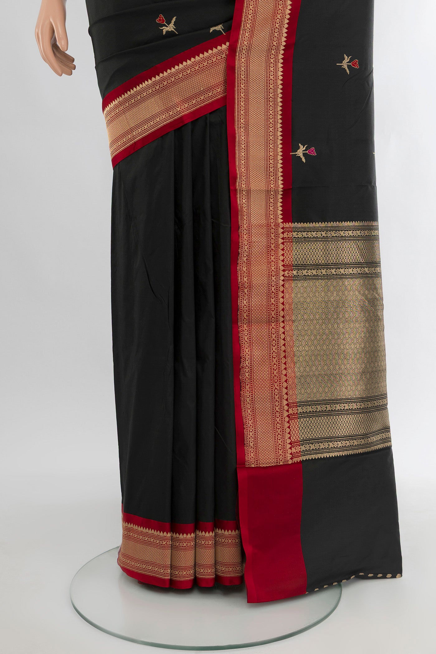 Pleats and pallu of Black Banarasi Katan Silk Saree with Zari Butta on the body and Zari Border. 