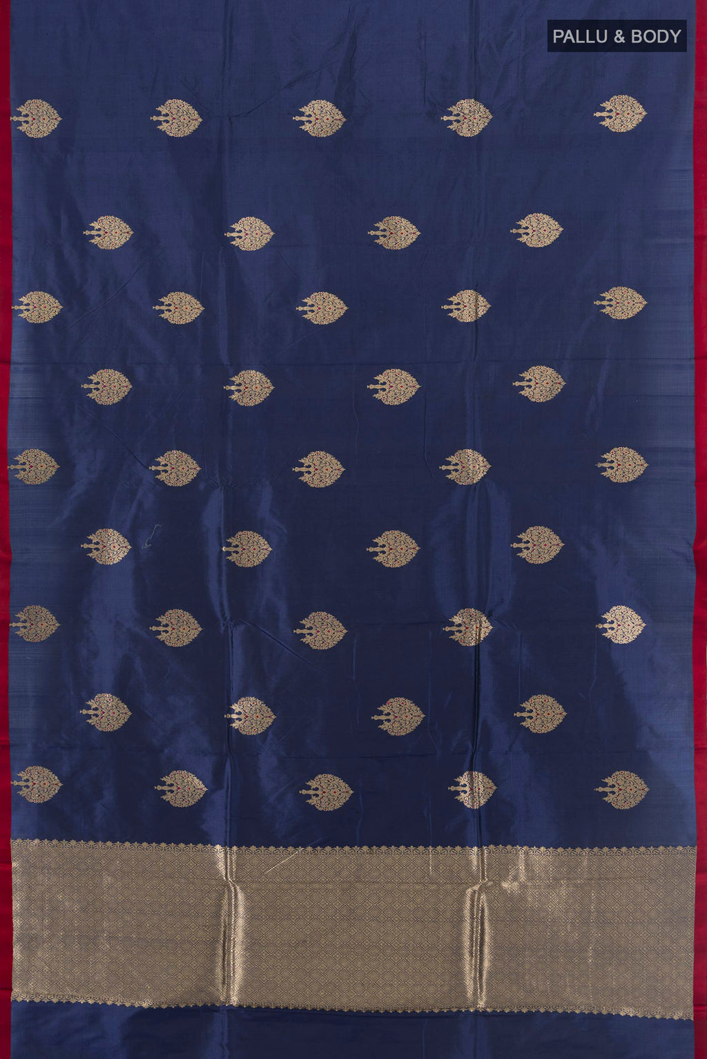 Flat view of Pure Silk Navy Blue Banarasi Katan Saree with Zari Butta on the body and Without Border. 