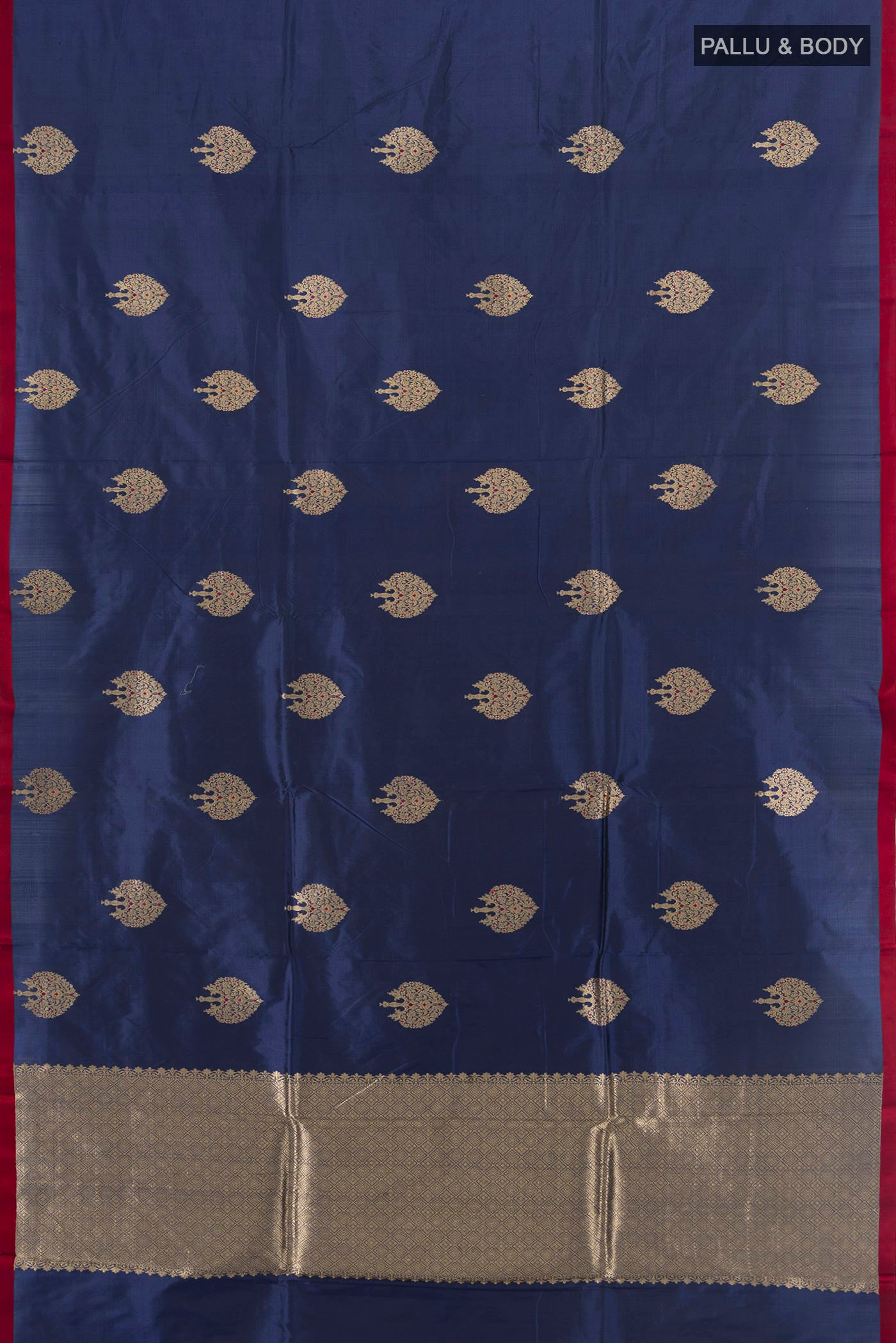 Flat view of Pure Silk Navy Blue Banarasi Katan Saree with Zari Butta on the body and Without Border. 