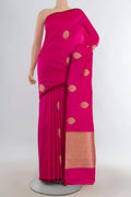 Pure Silk Rani Pink Banarasi Katan Saree with Zari Butta on the body and Without Border.  displayed on a mannequin