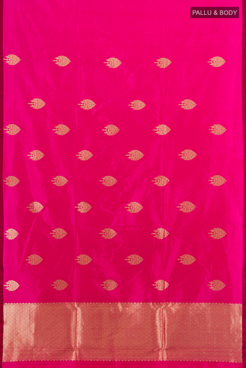 Flat view of Pure Silk Rani Pink Banarasi Katan Saree with Zari Butta on the body and Without Border. 