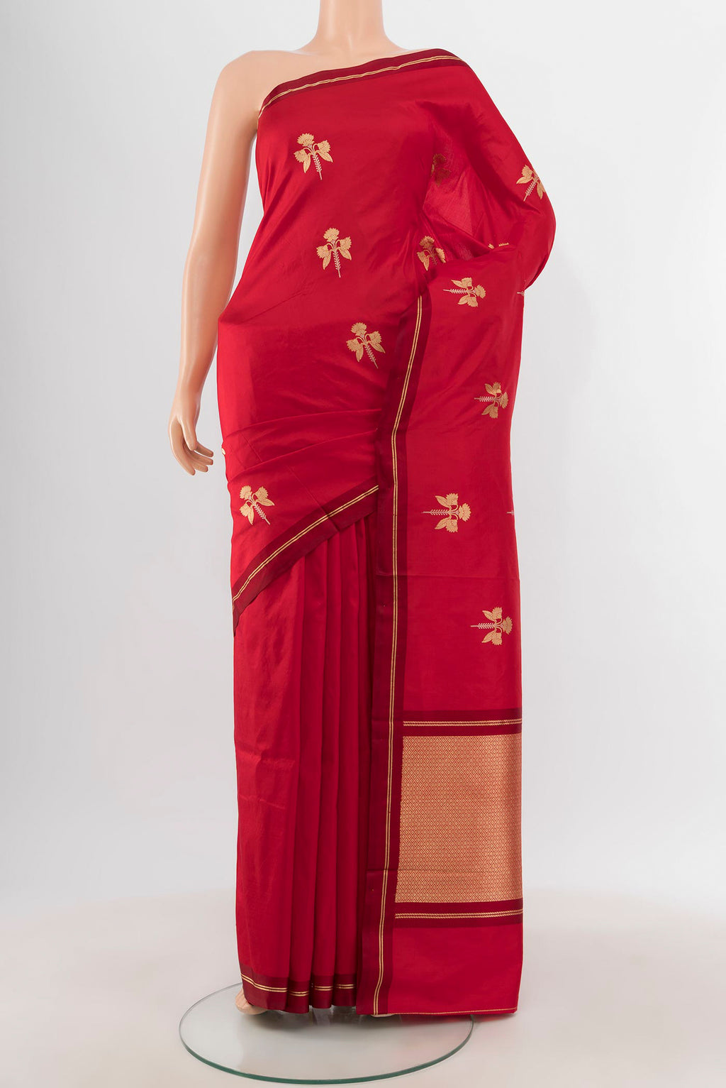 Red Banarasi Katan Silk Saree with Zari Butta on the body and Thin Zari Line.  displayed on a mannequin