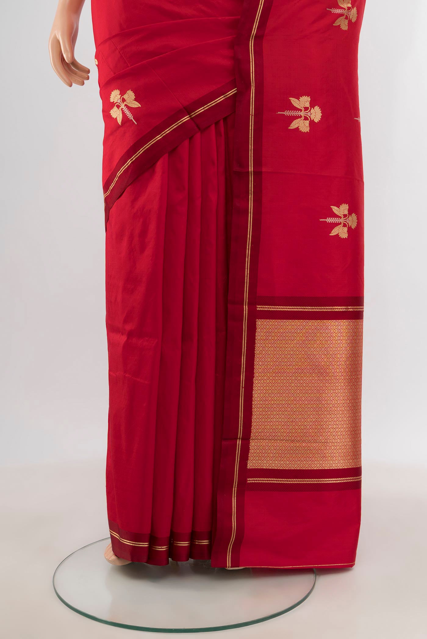 Pleats and pallu of Red Banarasi Katan Silk Saree with Zari Butta on the body and Thin Zari Line. 