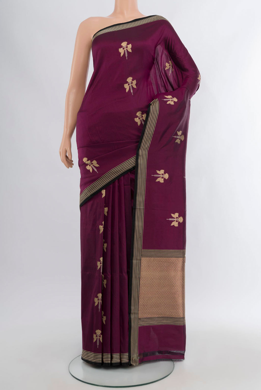 Purple Banarasi Katan Silk Saree with Zari Butta on the body and Zari Border.  displayed on a mannequin