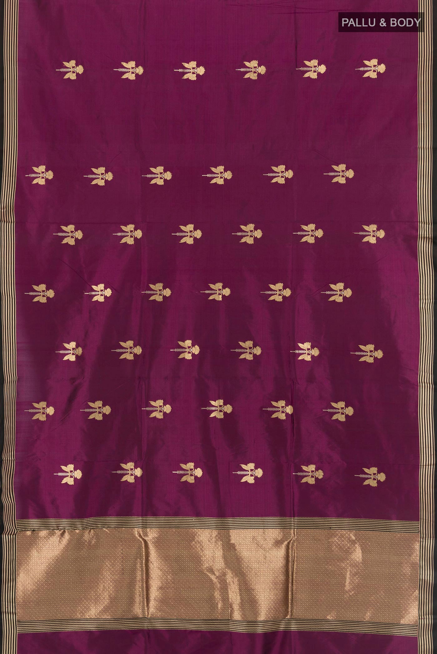 Flat view of Purple Banarasi Katan Silk Saree with Zari Butta on the body and Zari Border. 