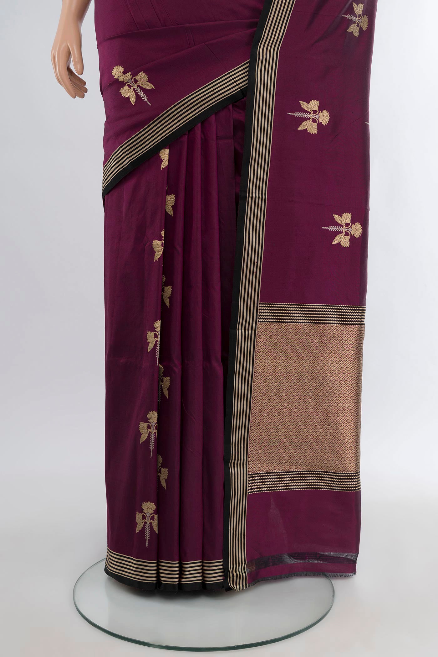 Pleats and pallu of Purple Banarasi Katan Silk Saree with Zari Butta on the body and Zari Border. 