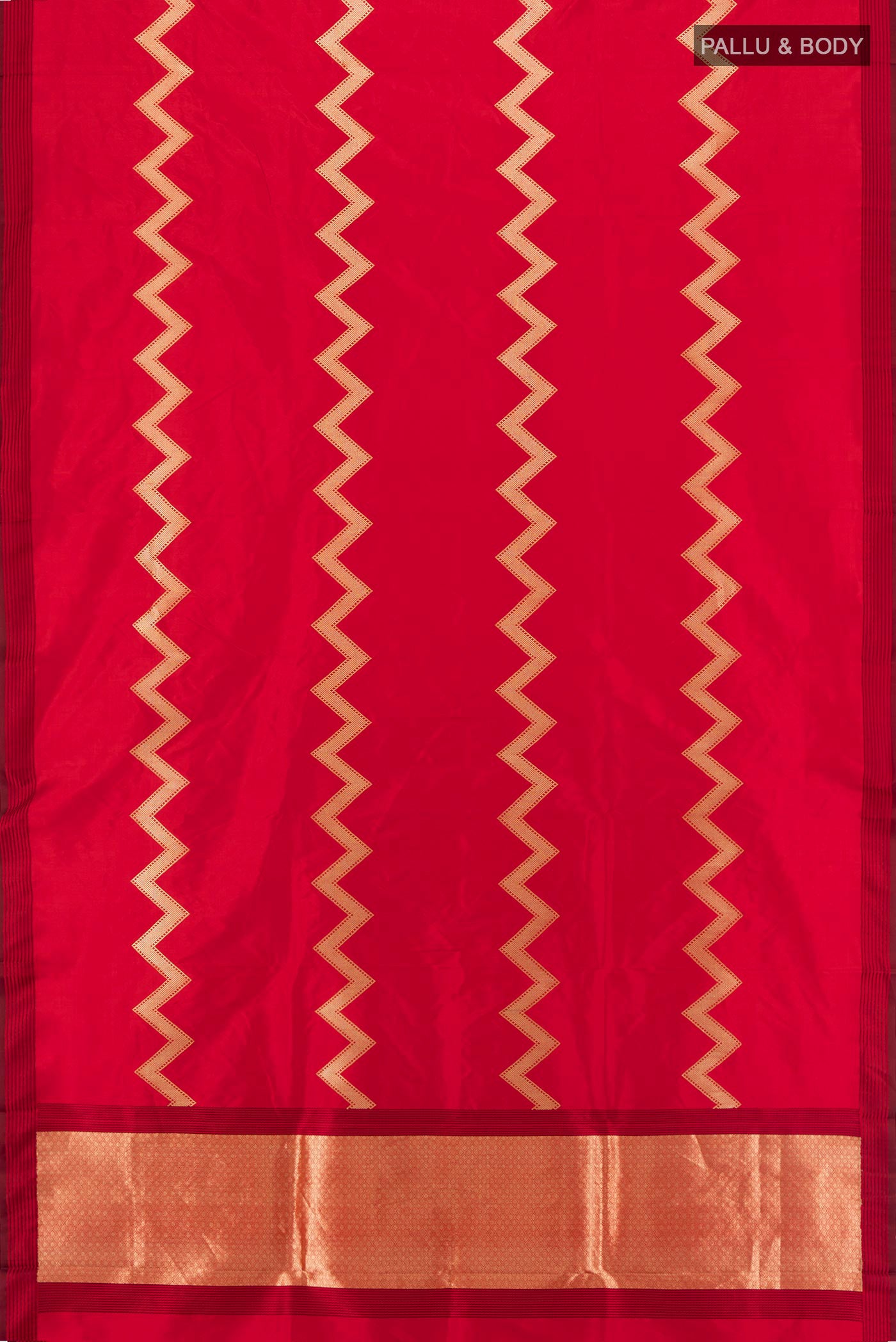 Flat view of Red Banarasi Katan Silk Saree with Zig Zag design on the body and Plain Border. 