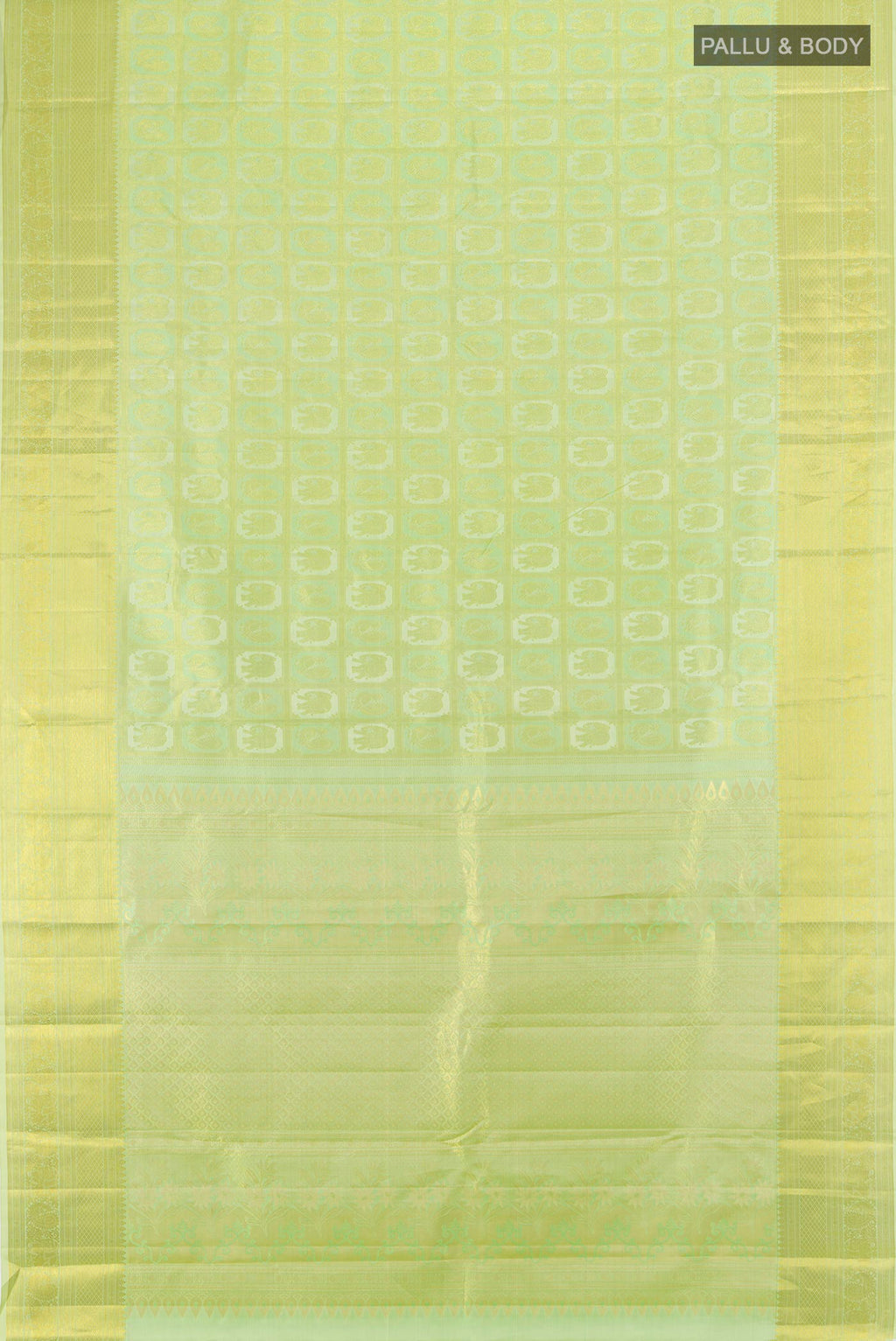 Flat view of Pista Green Kanchipuram Silk Saree with Zari Butta on the body and Zari Border. 