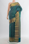 Peacock Blue Kanchipuram Silk Saree with Zari Brocade on the body and Zari Border.  displayed on a mannequin