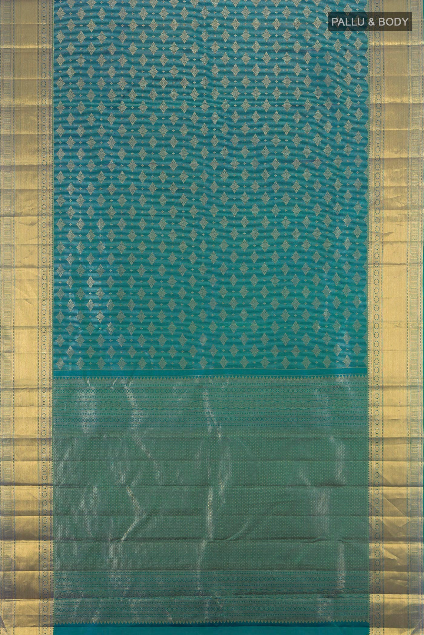 Flat view of Peacock Blue Kanchipuram Silk Saree with Zari Brocade on the body and Zari Border. 
