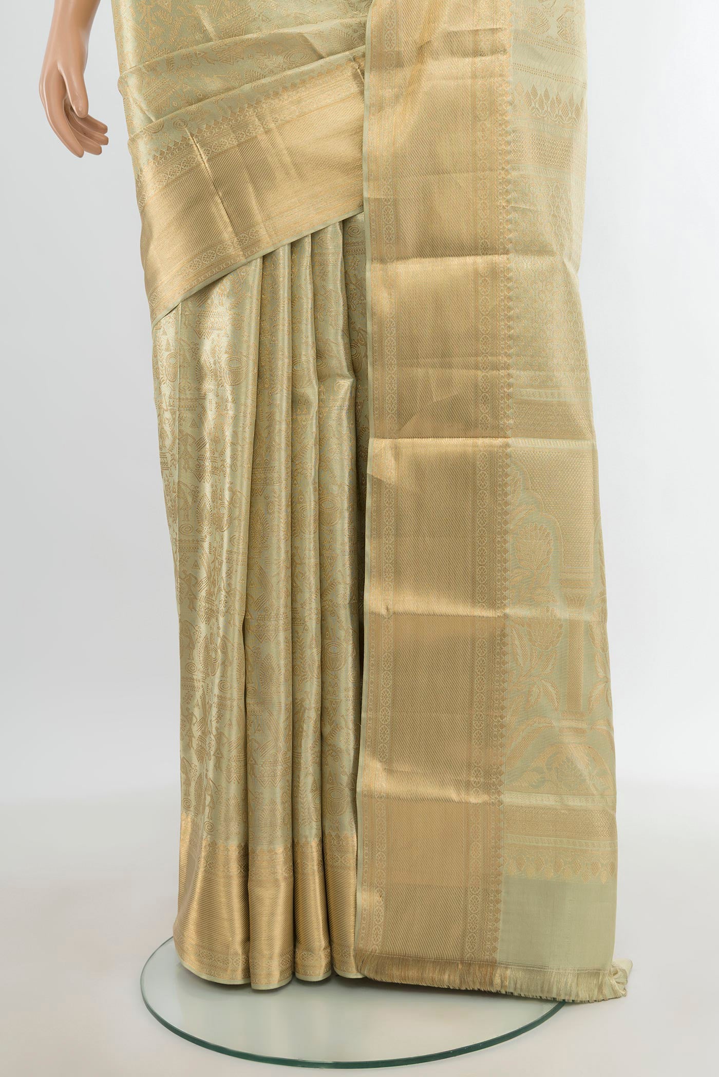 Pleats and pallu of Golden Kanchipuram Tissue Silk Saree with Zari Brocade on the body and Zari Border. 