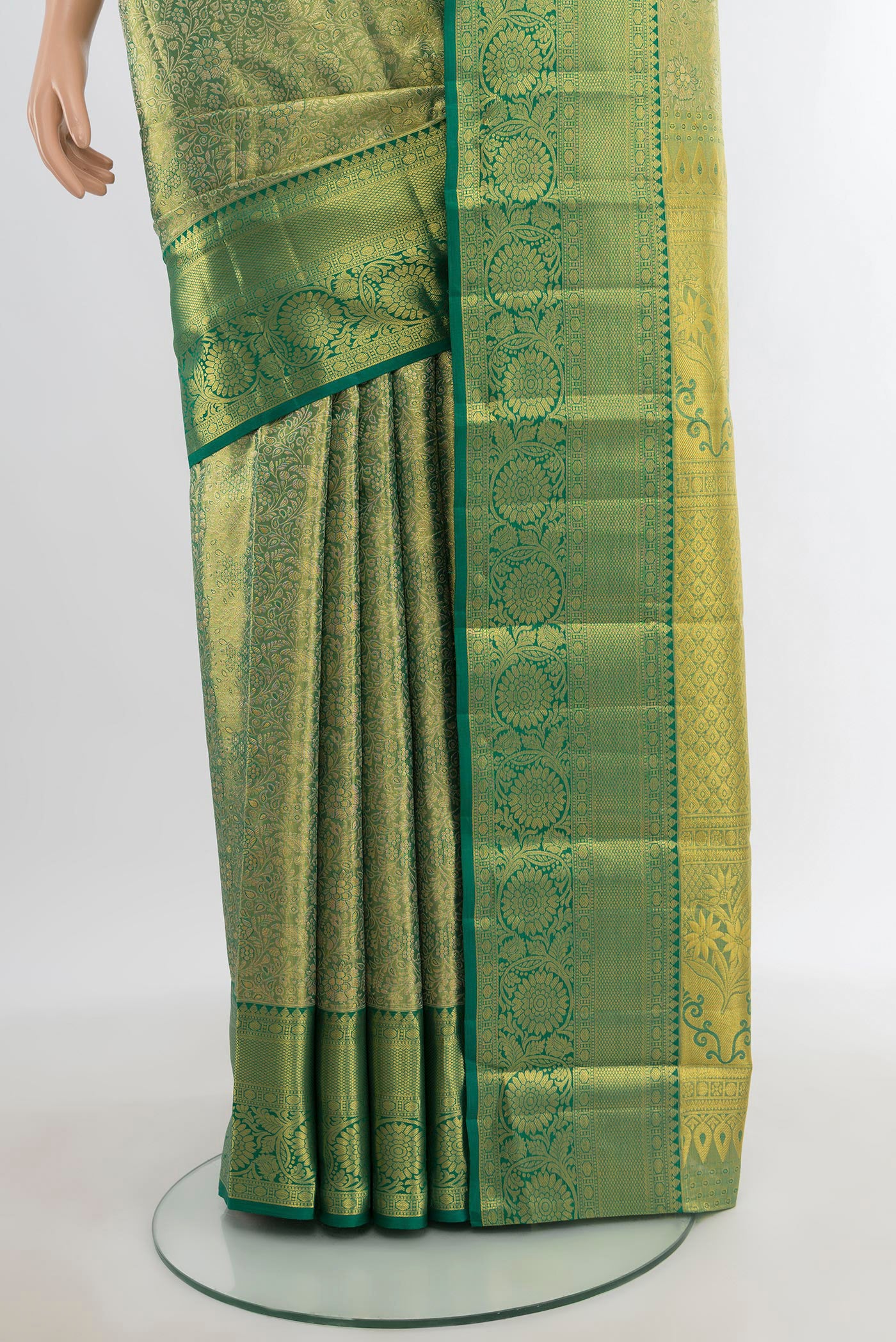 Pleats and pallu of Light Green Kanchipuram Tissue Silk Saree with Zari Brocade on the body and Zari Border. 