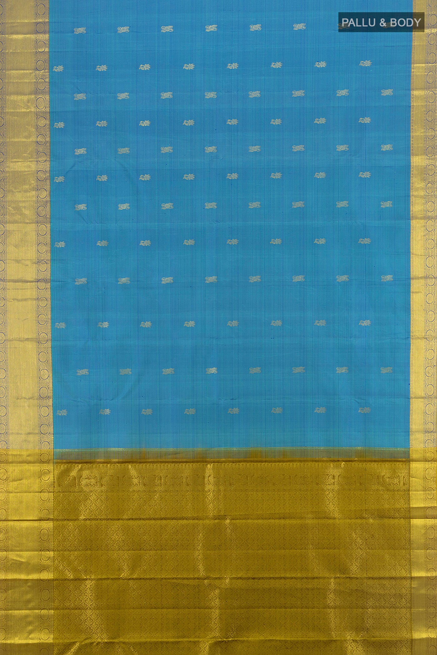 Flat view of Light Blue Kanchipuram Silk Saree with Zari Butta on the body and Zari Border. 