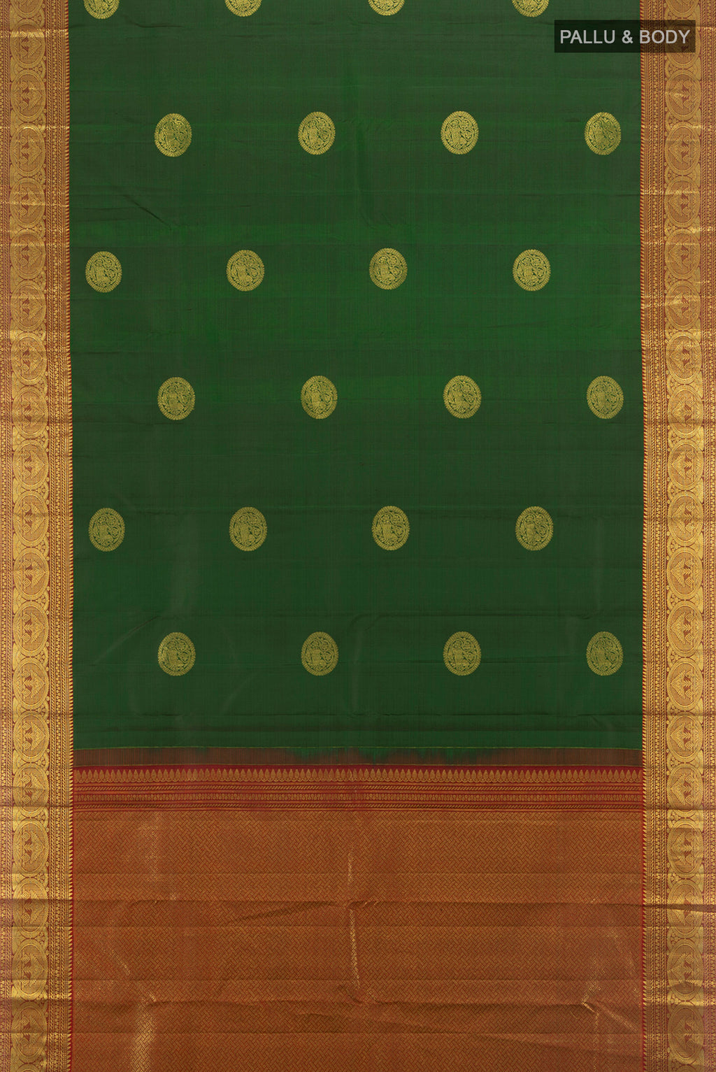 Flat view of Bottle Green Kanchipuram Silk Saree with Zari Butta on the body and Zari Border. 