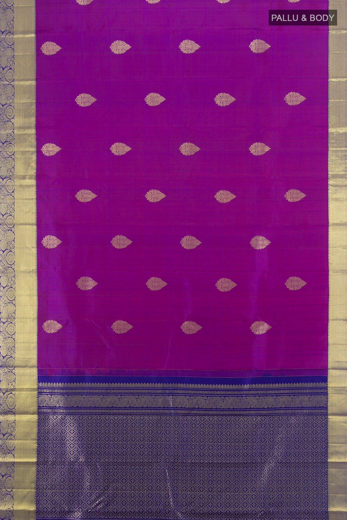 Flat view of Purple Kanchipuram Silk Saree with Zari Butta on the body and Zari Border. 