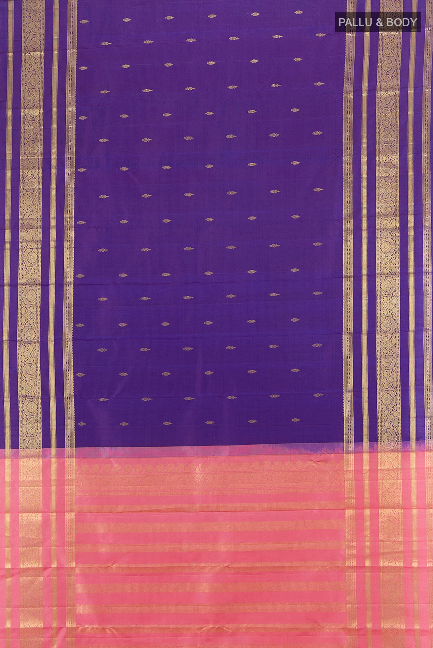 Flat view of Violet Kanchipuram Silk Saree with Zari Butta on the body and Zari Border. 