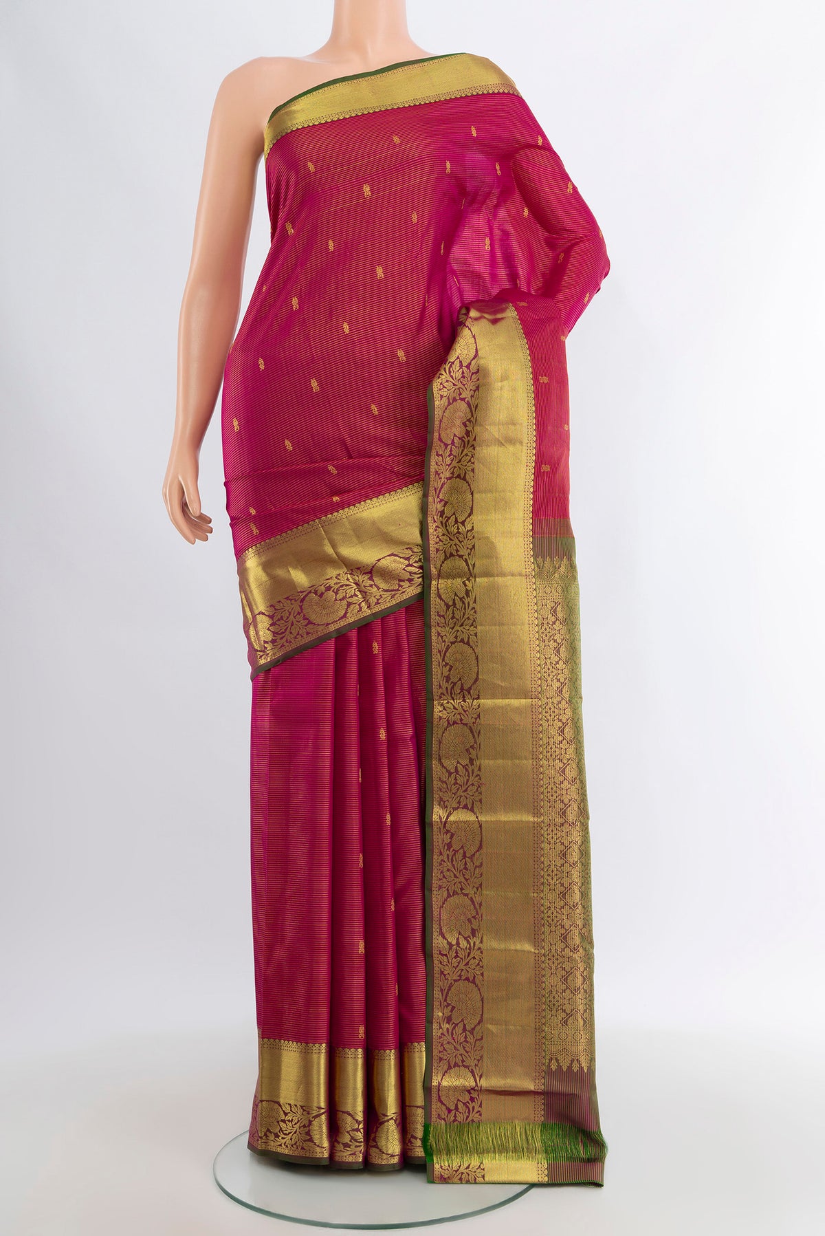 Pink Kanchipuram Silk Saree with Zari Butta on the body and Zari Border.  displayed on a mannequin