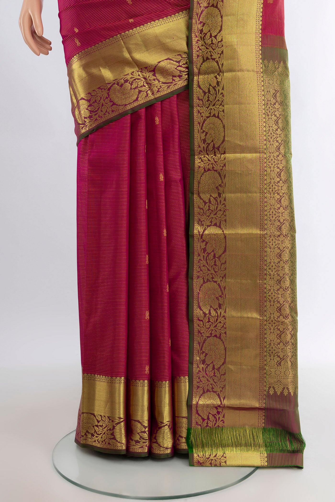 Pleats and pallu of Pink Kanchipuram Silk Saree with Zari Butta on the body and Zari Border. 