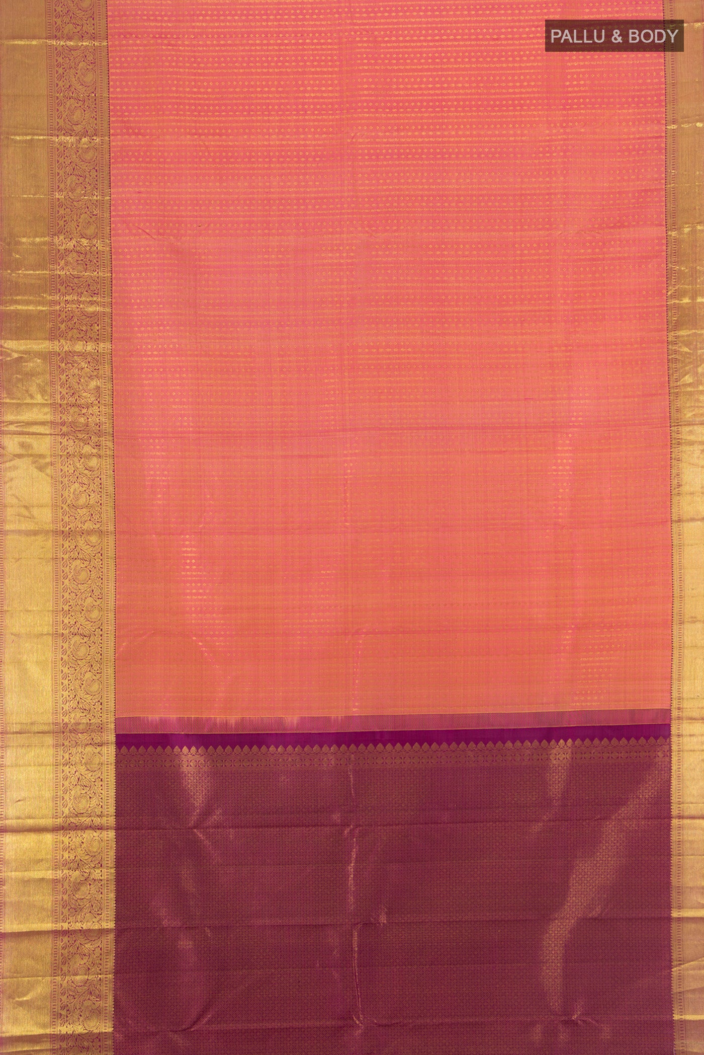 Flat view of Coral Kanchipuram Silk Saree with Zari Butta on the body and Zari Border. 