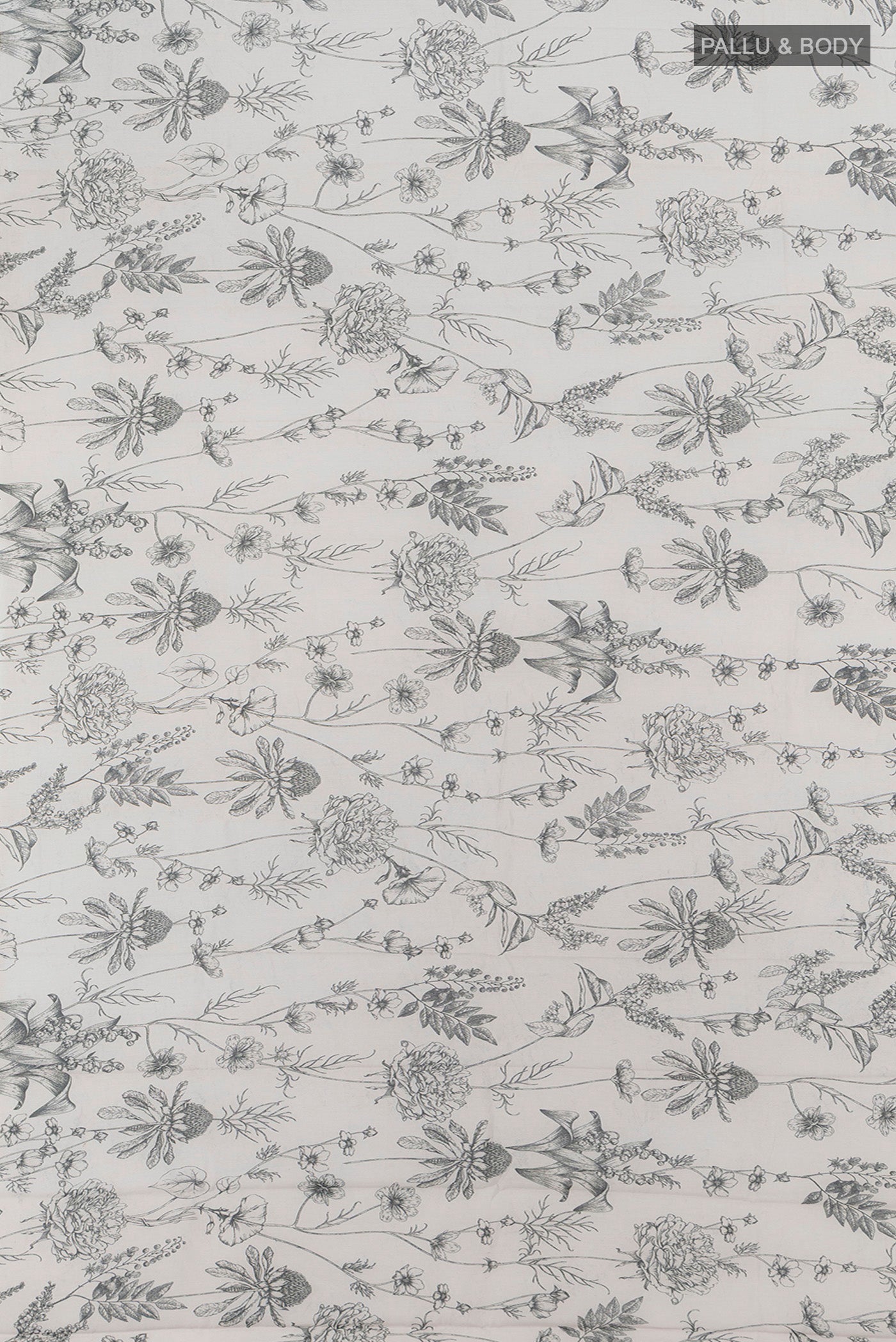 Flat view of Grey Maheshwari Silk Cotton Saree with Floral Print on the body and Thin Zari Line. 